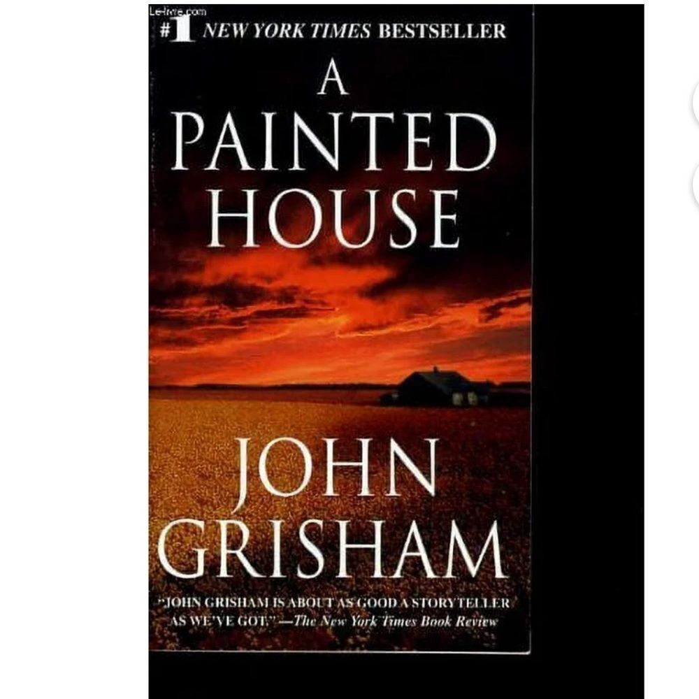 “A Painted House” a paperback by John Grisham!